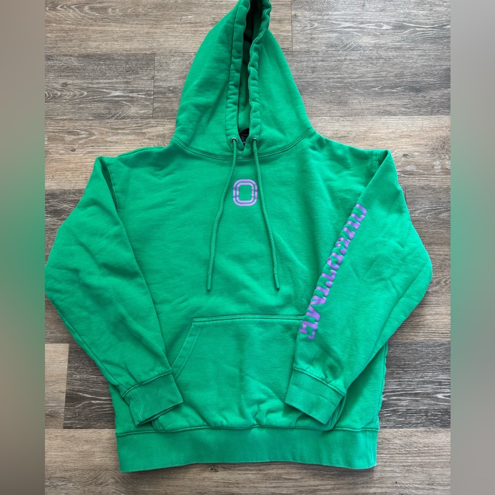 Green Hoodie with Purple Accents